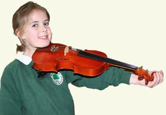 Child holding a violin to show the correct size of violin