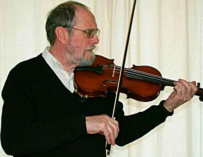 Playing in a violin to check the setup at the Violin Company